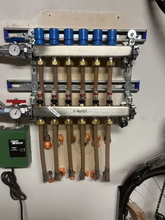 Plumber performing Gas Line Installation at a residential property in Fenton